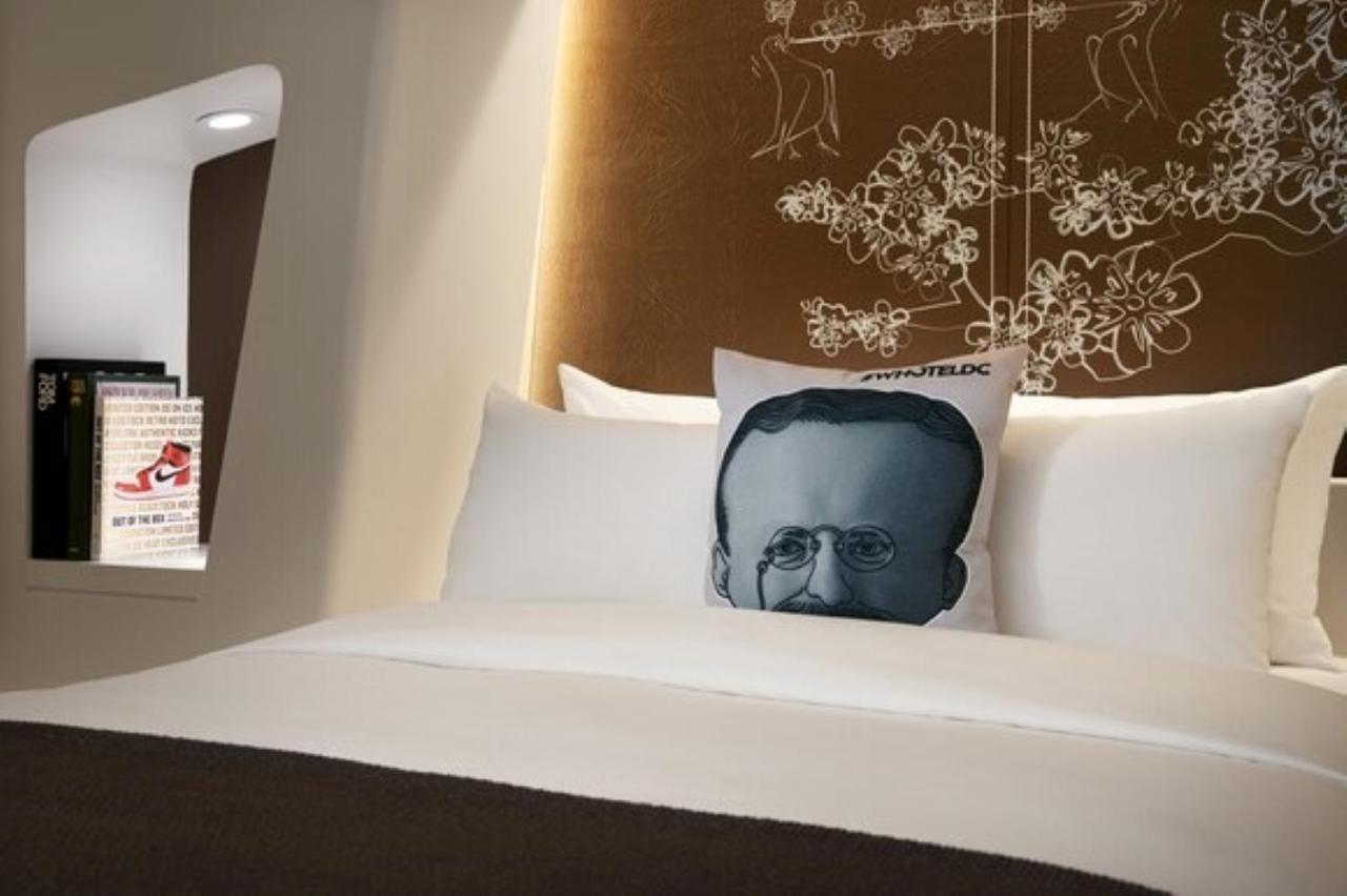 Hotel Washington Exterior photo A pillow with the face of the late dictator of North Korea, Kim Jong-Il, in a hotel room.